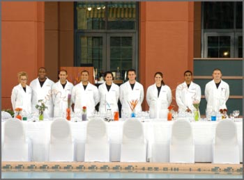 Chefs behind Table and Chairs