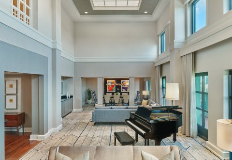 Dolphin Presidential Suite with Couches, Tables, Chairs and Grand Piano