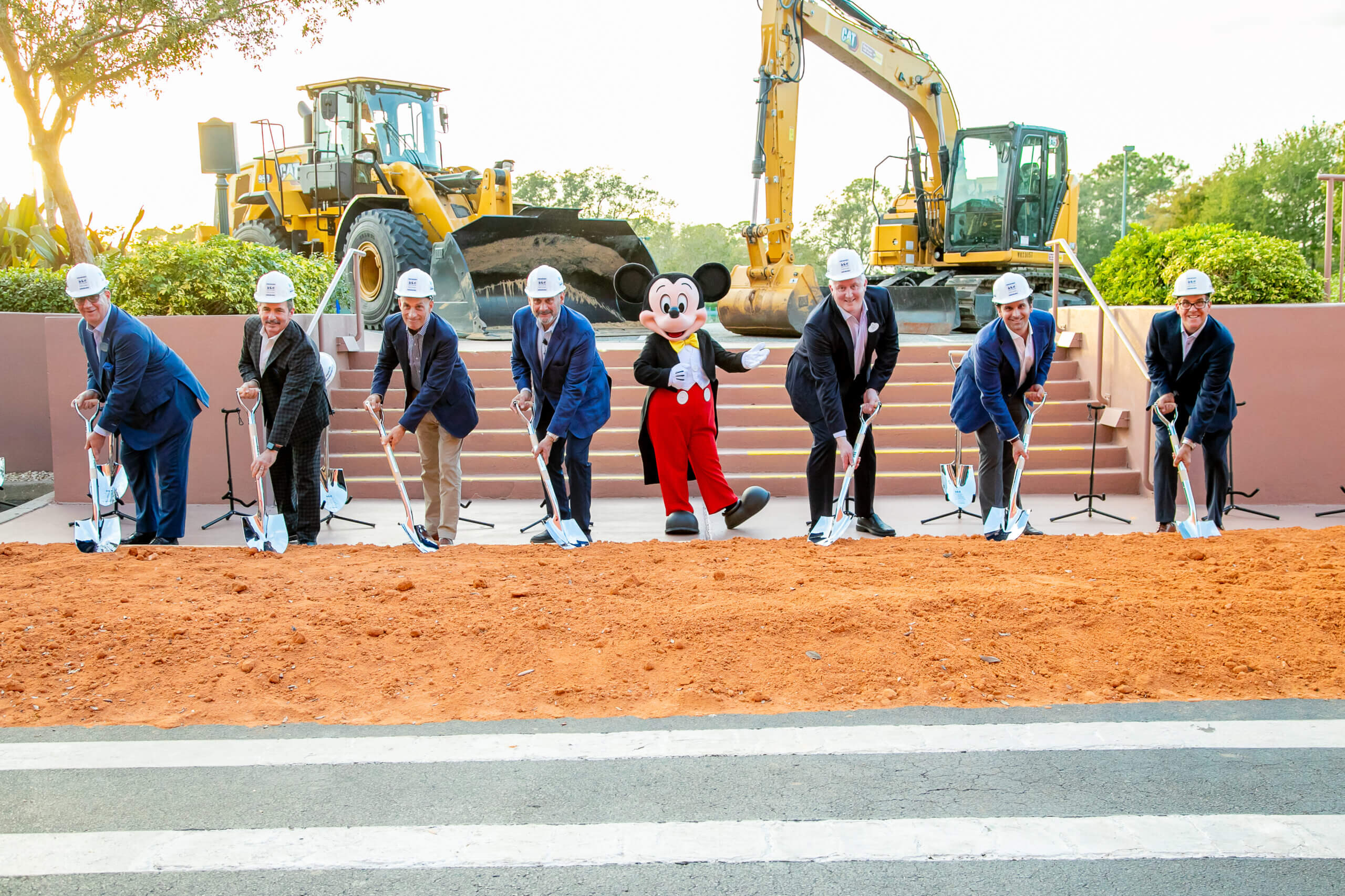 Dolphin groundbreaking photo with Mickey in the center.