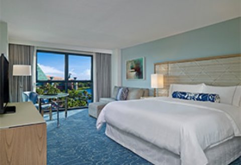 Swan Resort View Guest Room with Desk, Chair, Coach and Large TV