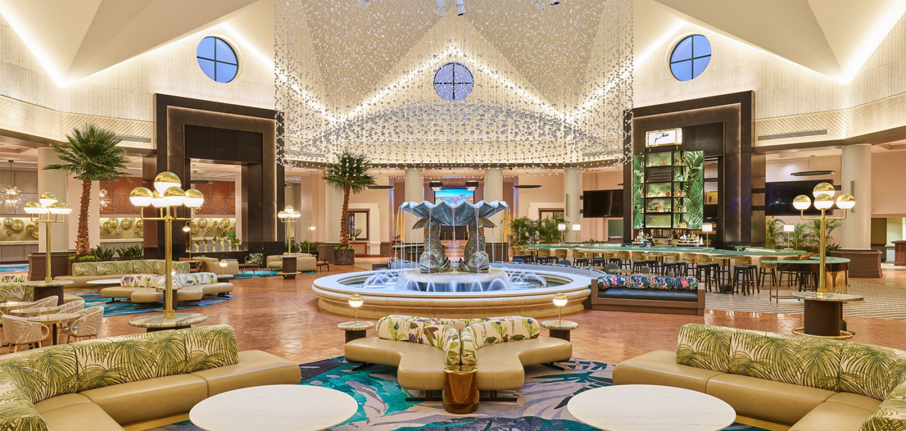 Sitting Area with Fountain, Couches, Tables and Lounge