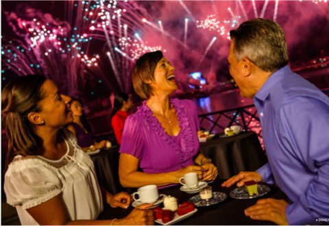 Banquet with Guests at a Table Watching Fireworks