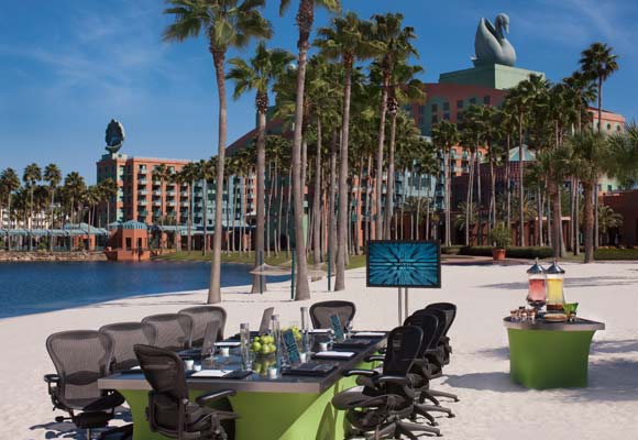 Tables, Chairs and TV on the Beach for a Meeting