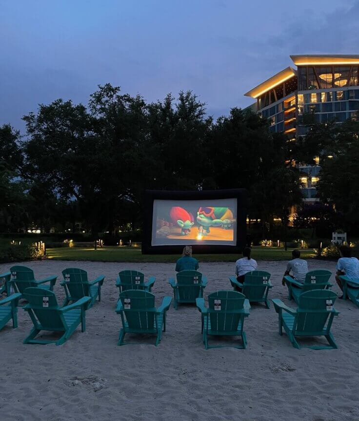Movie screen set up on the beach.