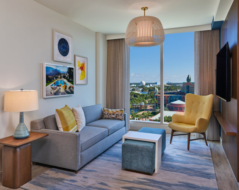 Swan Reserve Signature Queen Suite Parlor with Sofa, Comfortable Chair and Table